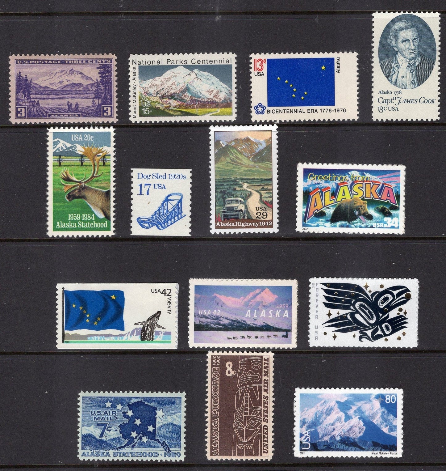 ALASKA COLLECTION #1 - 14 with Alaskan Scenes, Raven Story, State Flag, Mt McKinley, Cook, Dog Sled